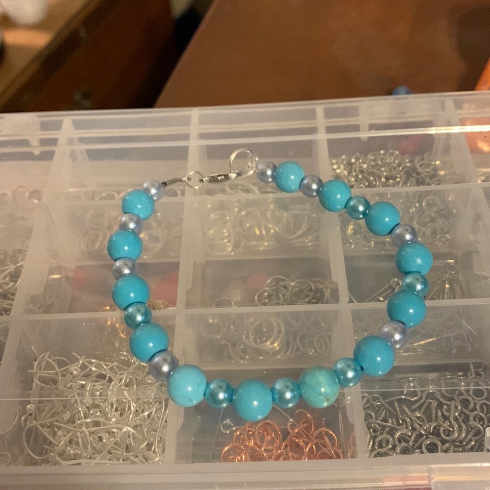 Braclet made with blue beads. New